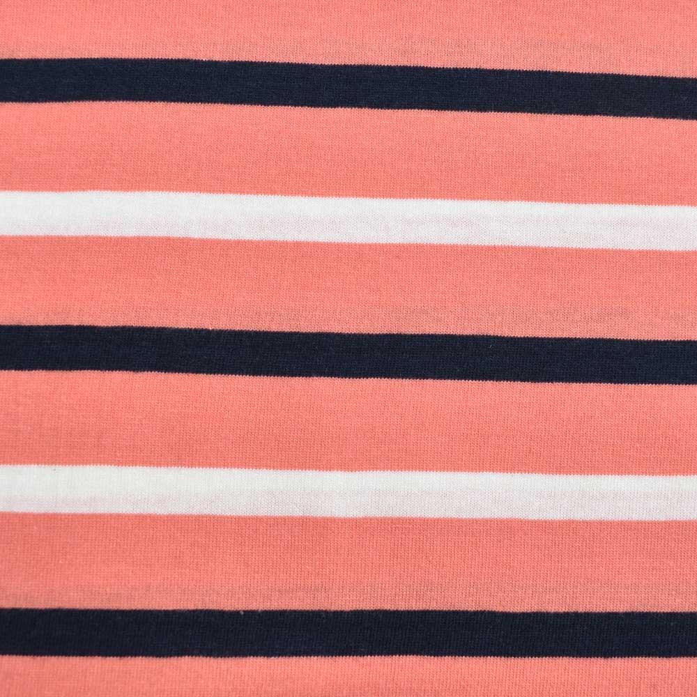 Weibliches Model mit CAMPS BAY Jerseykleid in Fusion Coral-Night Sky-Cloud Dancer