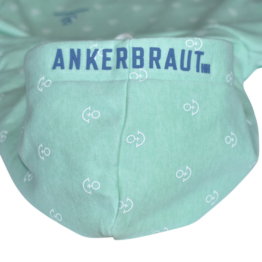 ANKERBRAUT Hoodie "...und vergiss nicht, glücklich zu sein" Weibliches Model mit ANKERBRAUT Hoodie in Mint Melange