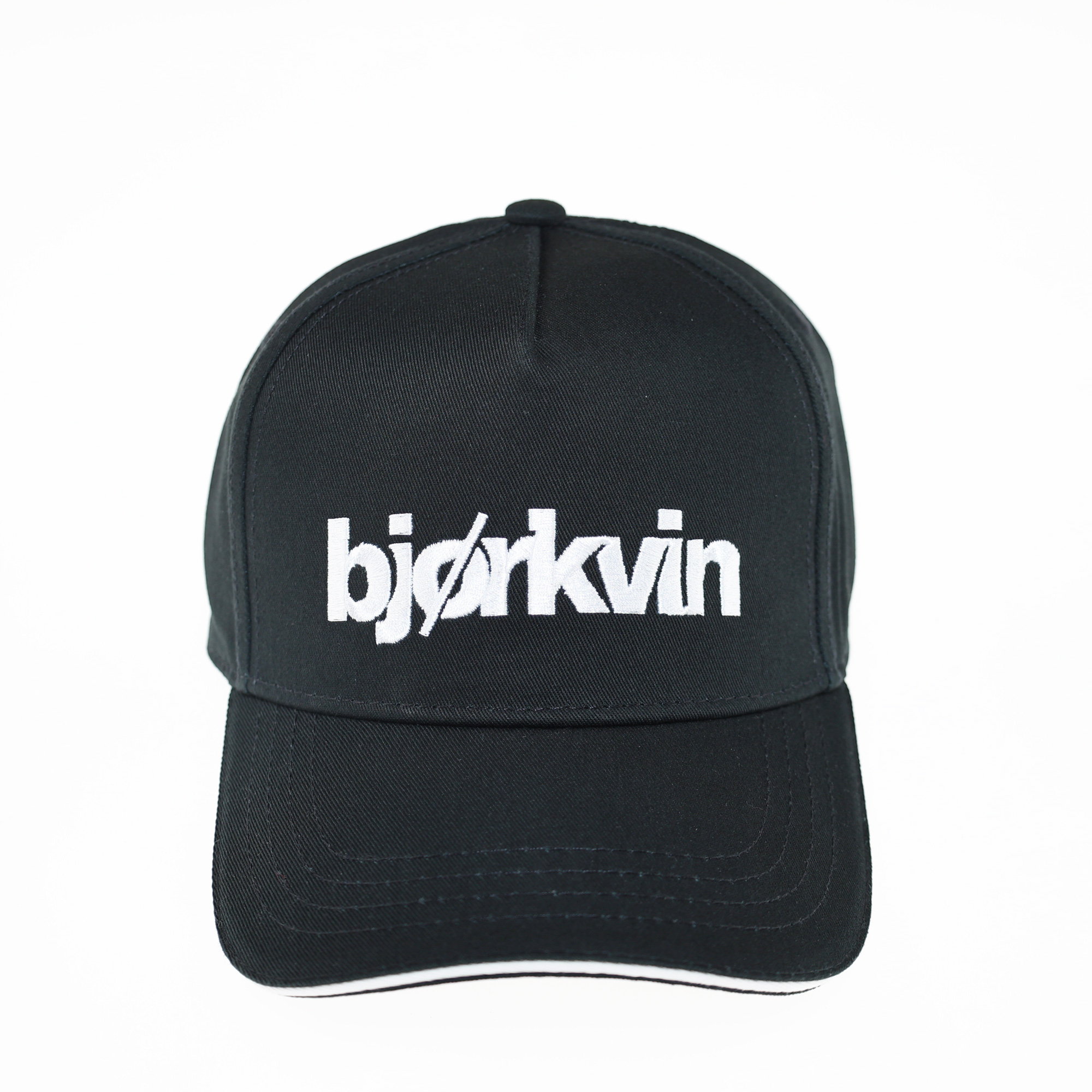 Männliches Model mit Björkvin Cap in Schwarz