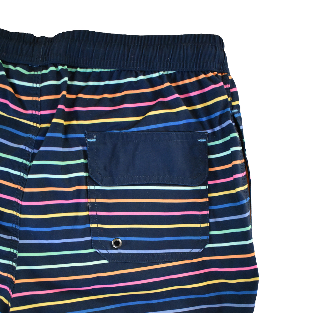 Männliches Model mit CAMPS BAY Bade-Shorts in Anse Lazio